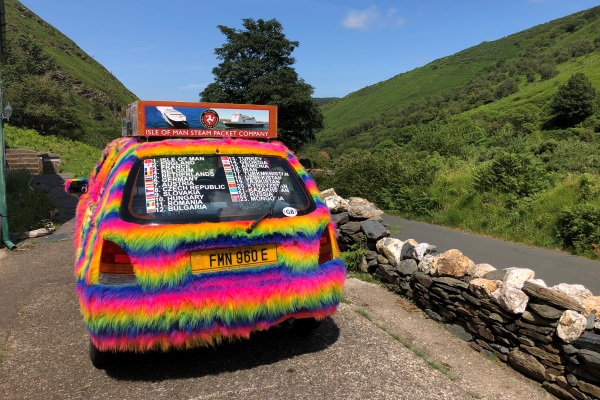 Team Mad Manx is embarking on a 10,000 mile road trip from the Isle of Man to Mongolia in a three-door, rainbow fur-covered hatchback