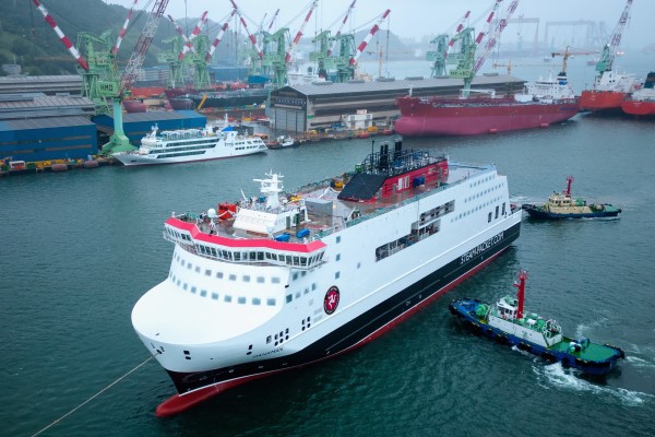 Vessel Manxman in harbour at sea being built with cranes in background