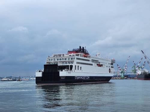 Ferry at sea departing harbour