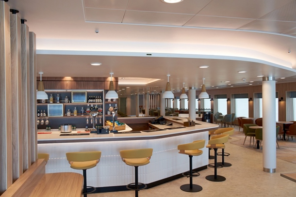 View looking at the bar with bar stools on a ferry